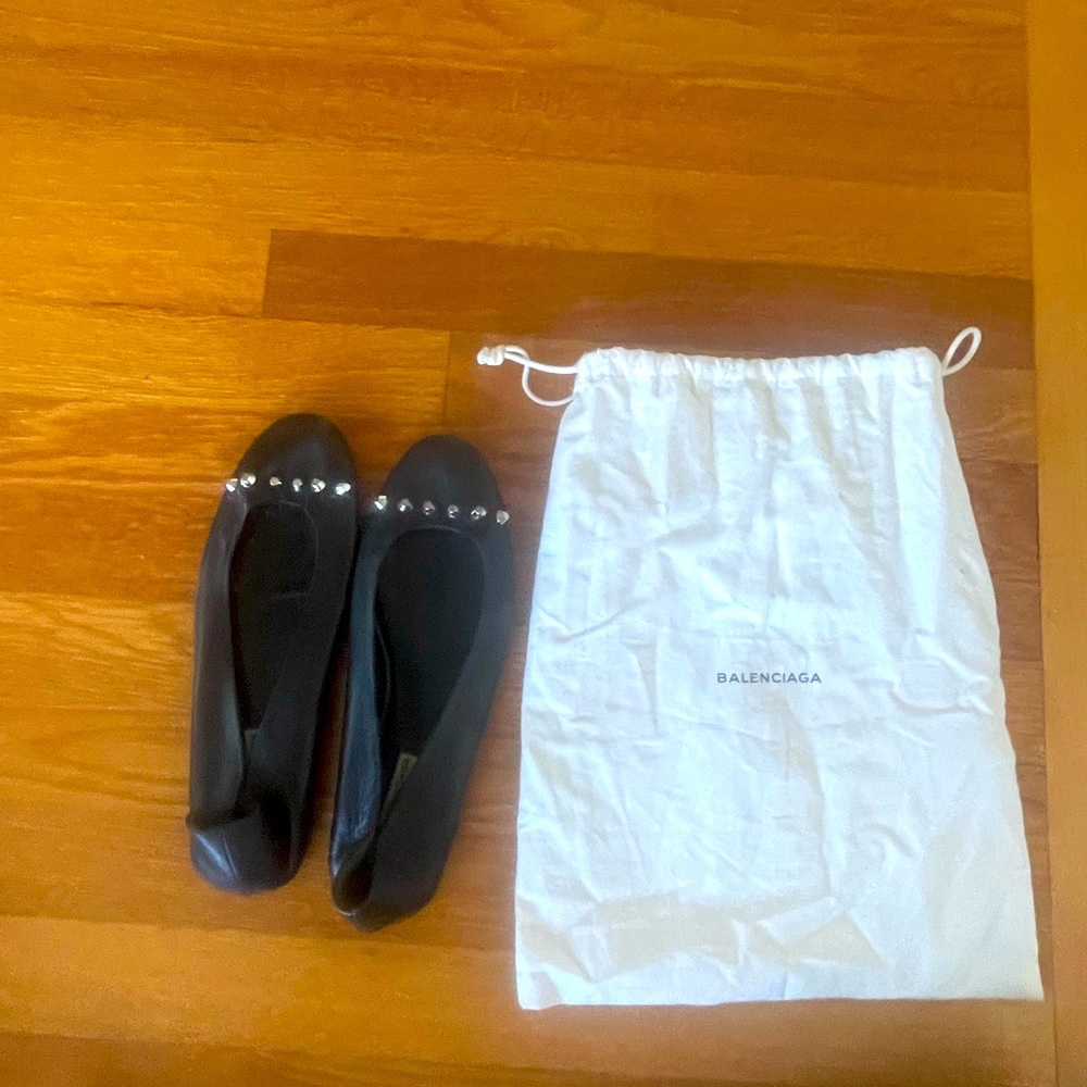 Black Balenciaga studded flats.